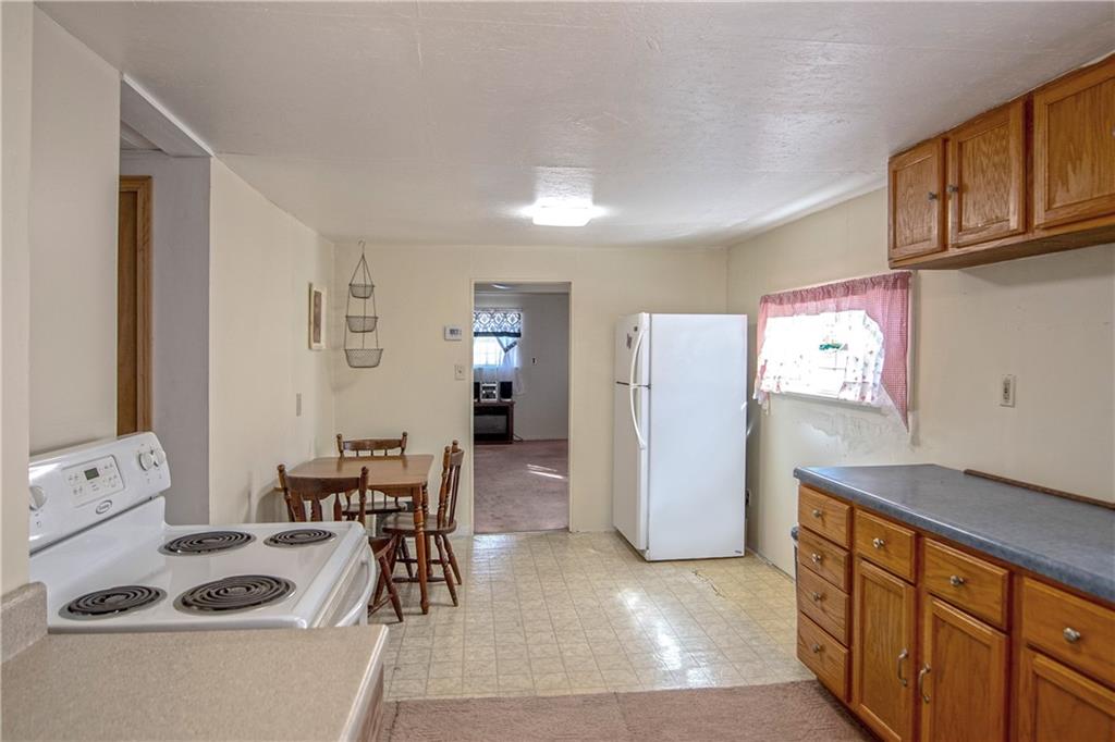 855 Highway 56 Apollo, PA 15613 - Photo 14 of 25 a kitchen with stainless steel appliances granite countertop a refrigerator and a stove top oven