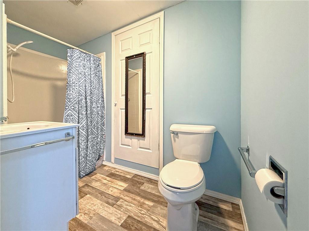 855 Highway 56 Apollo, PA 15613 - Photo 18 of 25 a bathroom with a toilet a sink and a shower