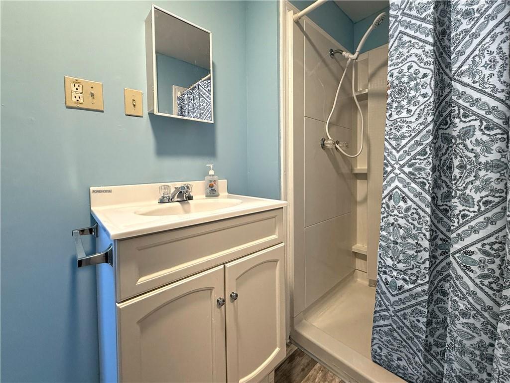 855 Highway 56 Apollo, PA 15613 - Photo 19 of 25 a bathroom with a sink and a mirror