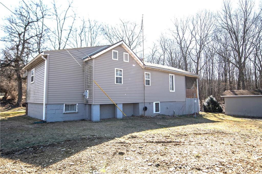 855 Highway 56 Apollo, PA 15613 - Photo 5 of 25 a view of a house with a yard covered in snow