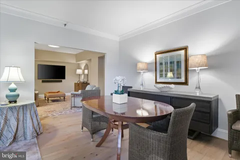 a bedroom with a bed and a lamp