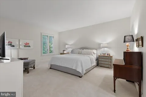 a spacious bathroom with a double vanity sink double and mirror