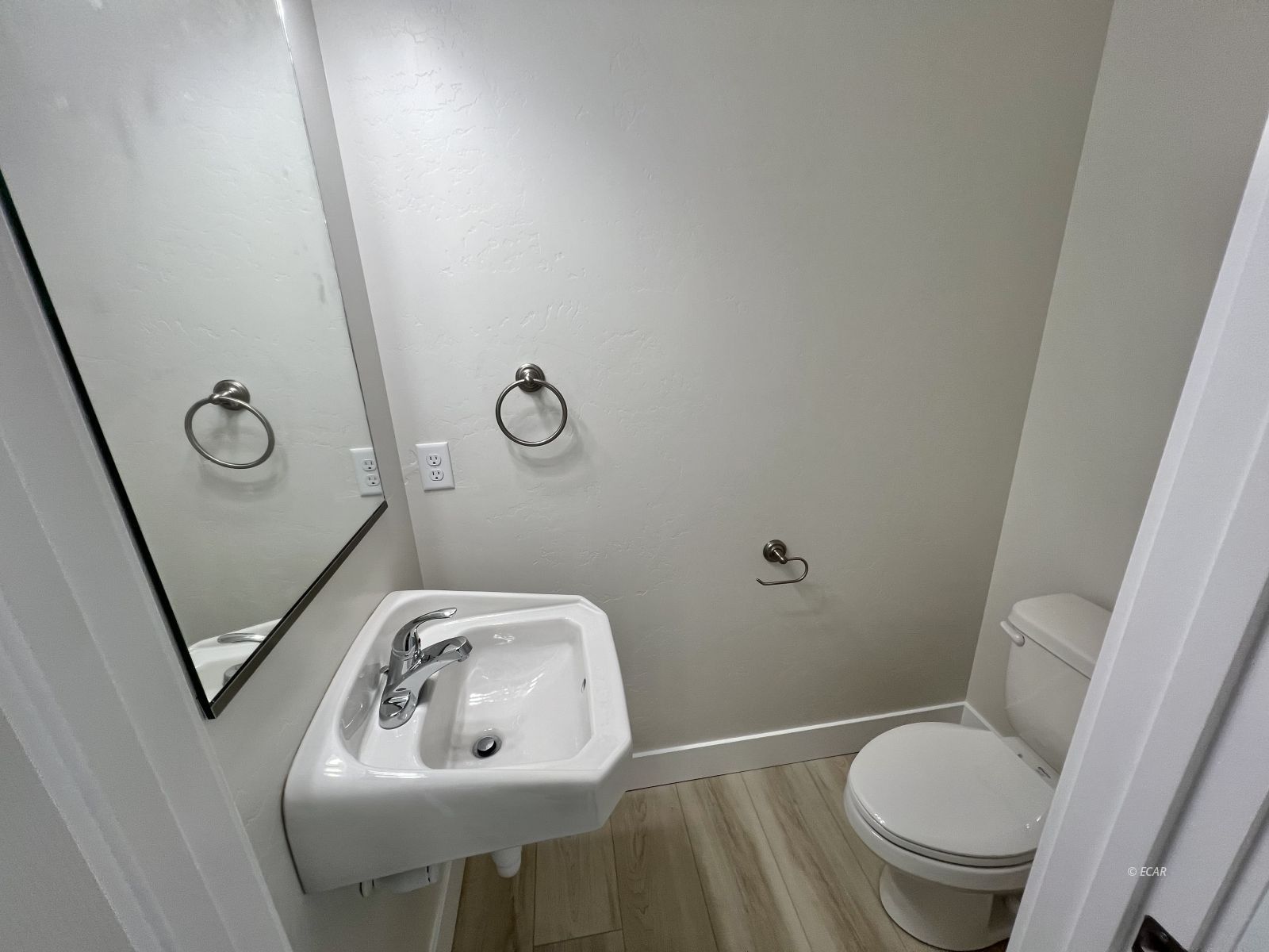 518 Ridgeway Drive Spring Creek, NV 89815 - Photo 21 of 37 a bathroom with a sink a toilet and a mirror
