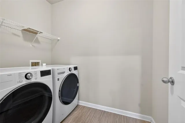 a utility room with dryer and washer
