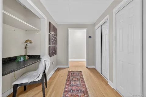 a living room with a furniture and a window