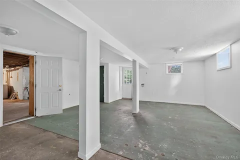 a balcony with wooden floor and fence