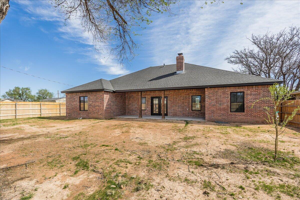907 Oak Avenue Panhandle, TX 79068 - Photo 29 of 30 a front view of a house with a yard