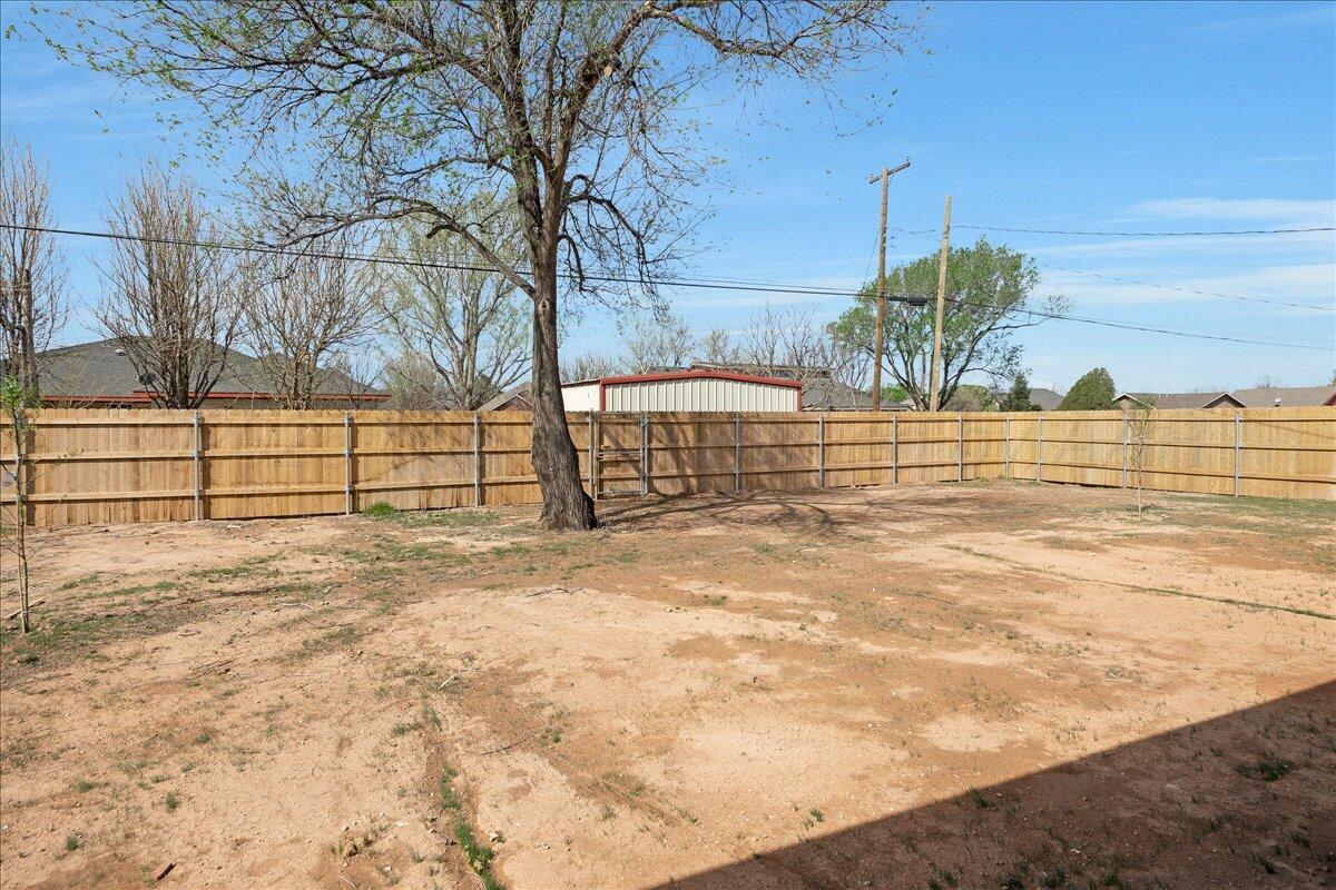 907 Oak Avenue Panhandle, TX 79068 - Photo 30 of 30 a view of a yard with an outdoor space