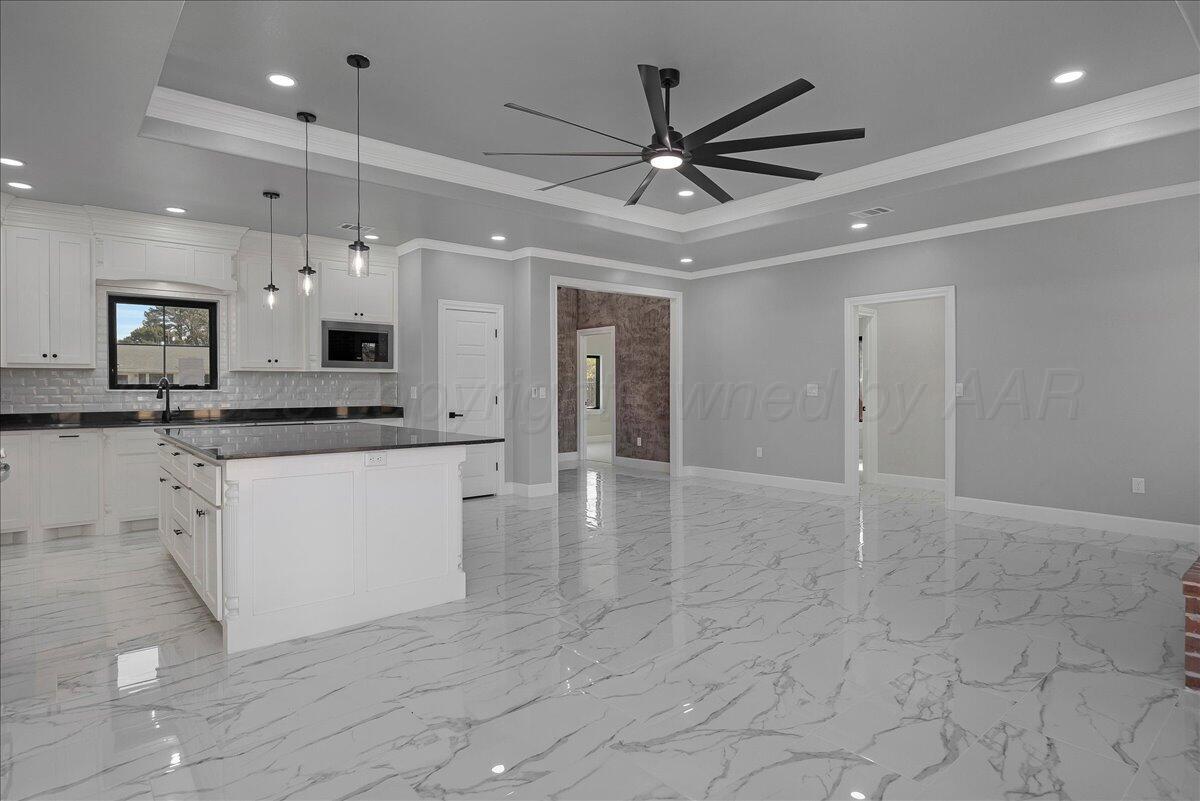 907 Oak Avenue Panhandle, TX 79068 - Photo 6 of 30 a view of a kitchen with marble kitchen and stainless steel appliances