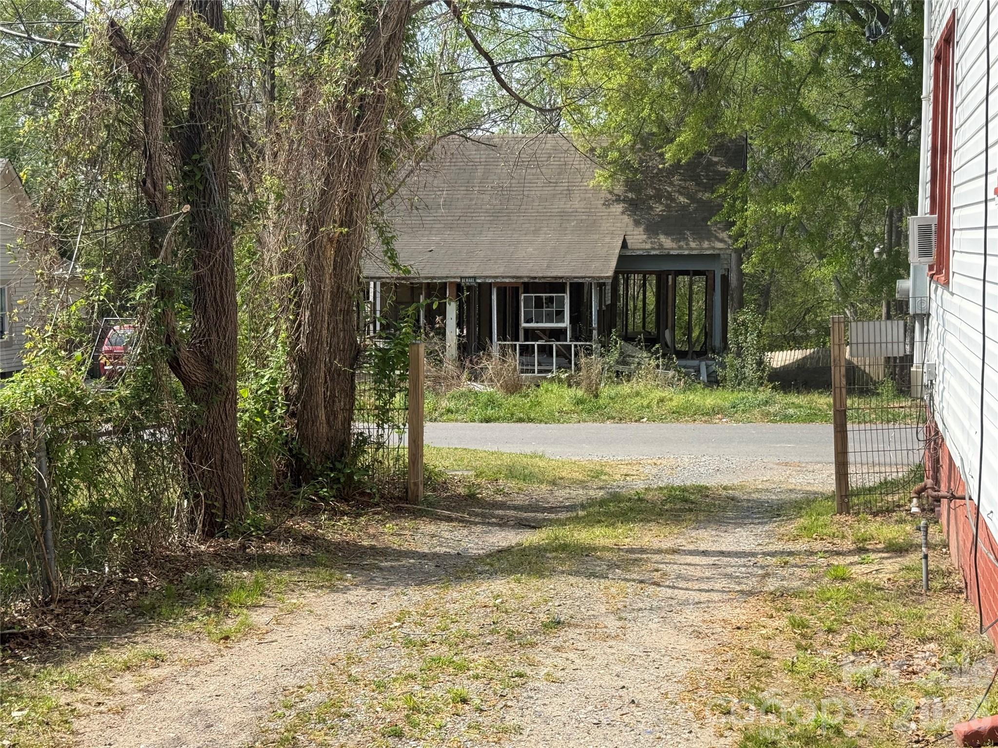 965 13th Street Lancaster, SC 29720 - Photo 7 of 17 a view of a house with backyard and trees