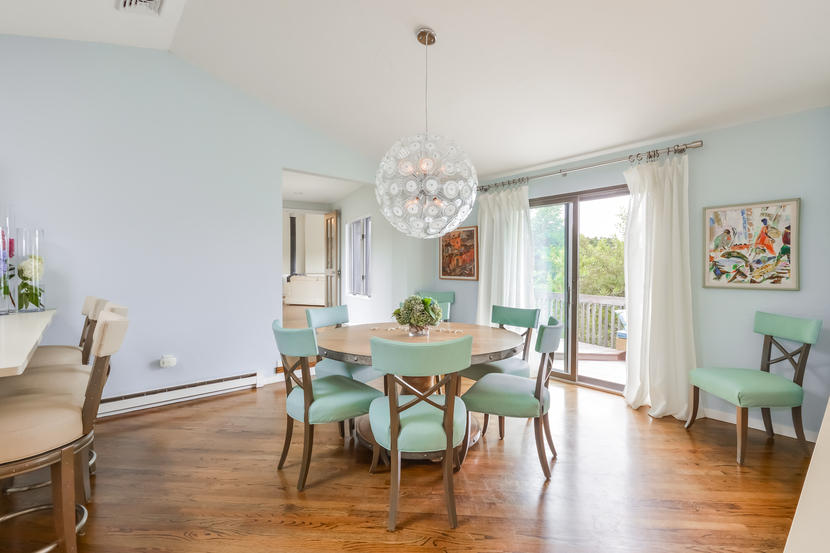 19 Turnstone Road Truro, MA 02666 - Photo 6 of 34 a view of a dining room with furniture window and wooden floor