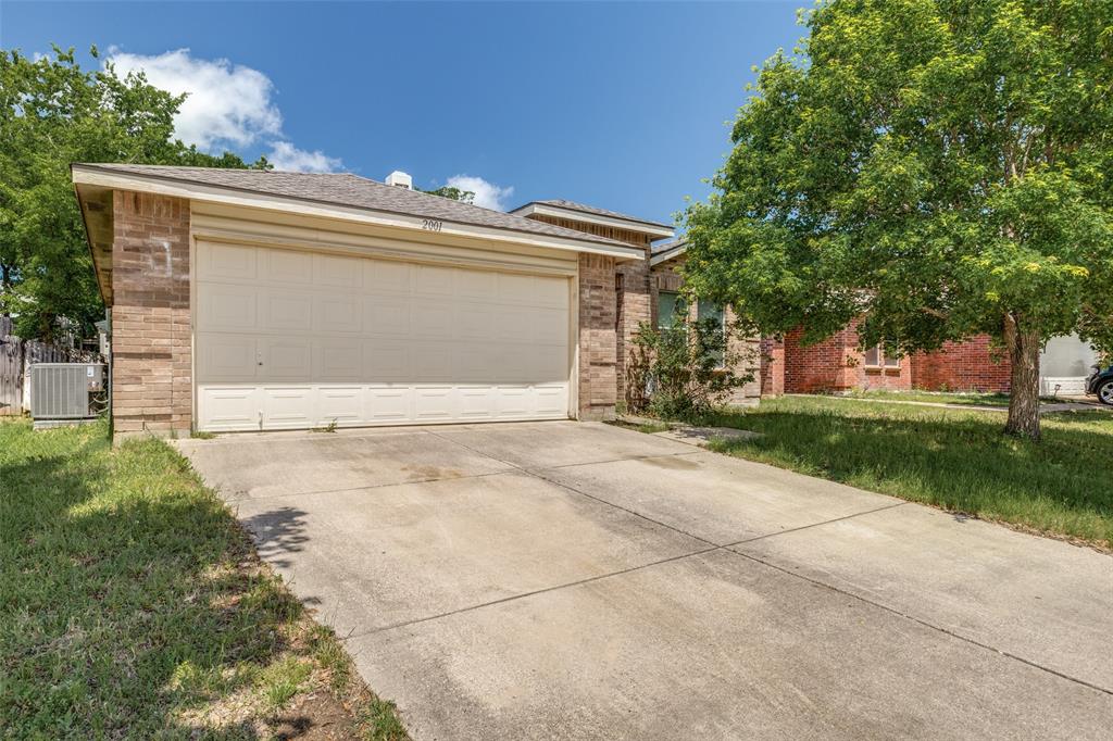 2001 Shawnee Trail Justin, TX 76247 - Photo 1 of 1 a view of a house with a yard
