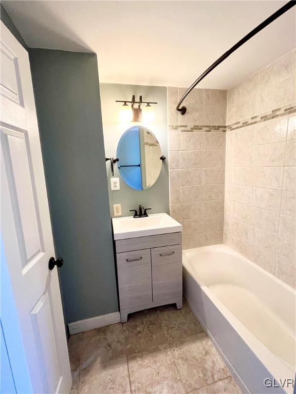 2218 Village Road Orefield, PA 18069 - Photo 14 of 28 a bathroom with a tub a sink and a mirror