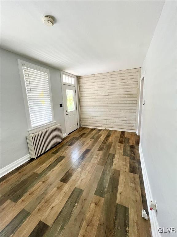 2218 Village Road Orefield, PA 18069 - Photo 6 of 28 an empty room with wooden floor and windows