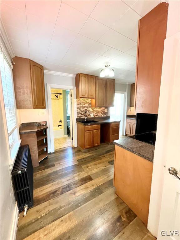 2218 Village Road Orefield, PA 18069 - Photo 7 of 28 a living room with stainless steel appliances furniture a fireplace and a kitchen view