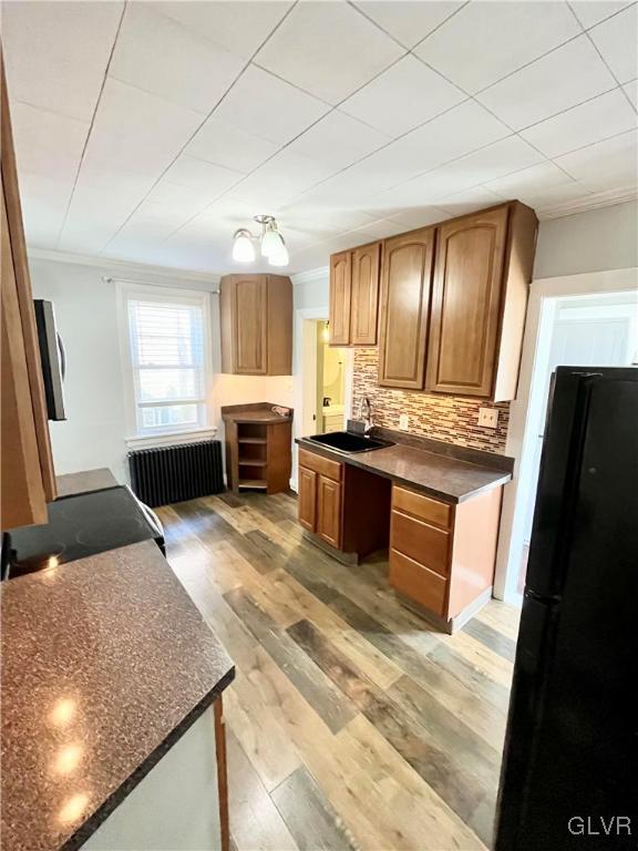 2218 Village Road Orefield, PA 18069 - Photo 8 of 28 a kitchen with stainless steel appliances granite countertop a stove a sink and a refrigerator