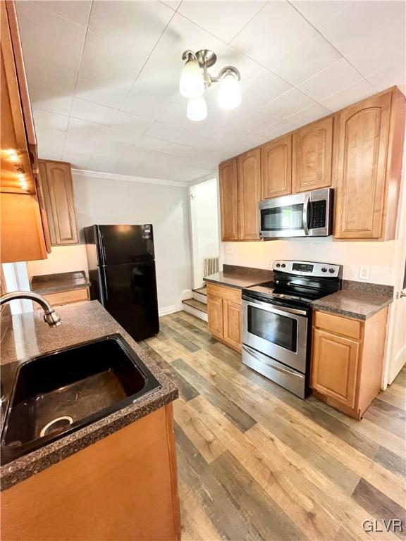 2218 Village Road Orefield, PA 18069 - Photo 9 of 28 a kitchen with granite countertop a refrigerator stove and sink