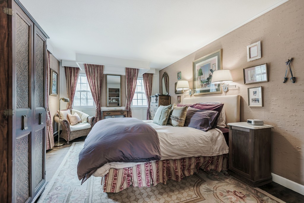 161 Raleigh Tavern Lane North Andover, MA 01845 - Photo 19 of 30 a spacious bedroom with a bed a couch and dresser