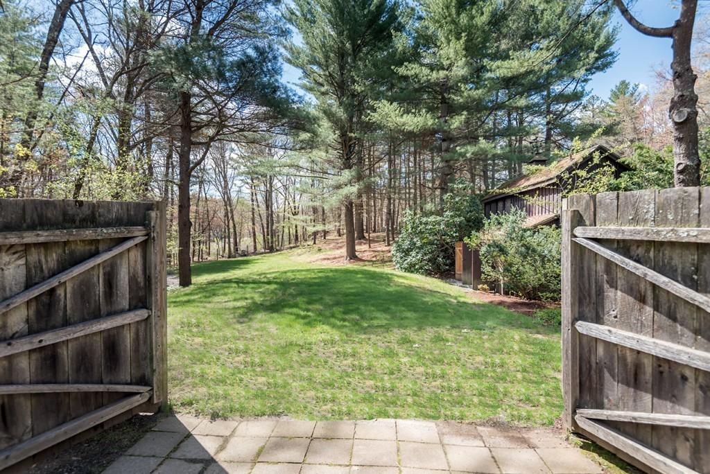 161 Raleigh Tavern Lane North Andover, MA 01845 - Photo 2 of 30 a backyard of a house with lots of green space