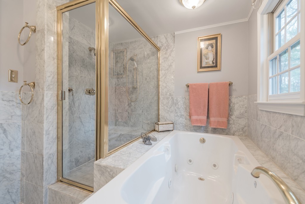 161 Raleigh Tavern Lane North Andover, MA 01845 - Photo 21 of 30 a bathroom with a bathtub and a shower