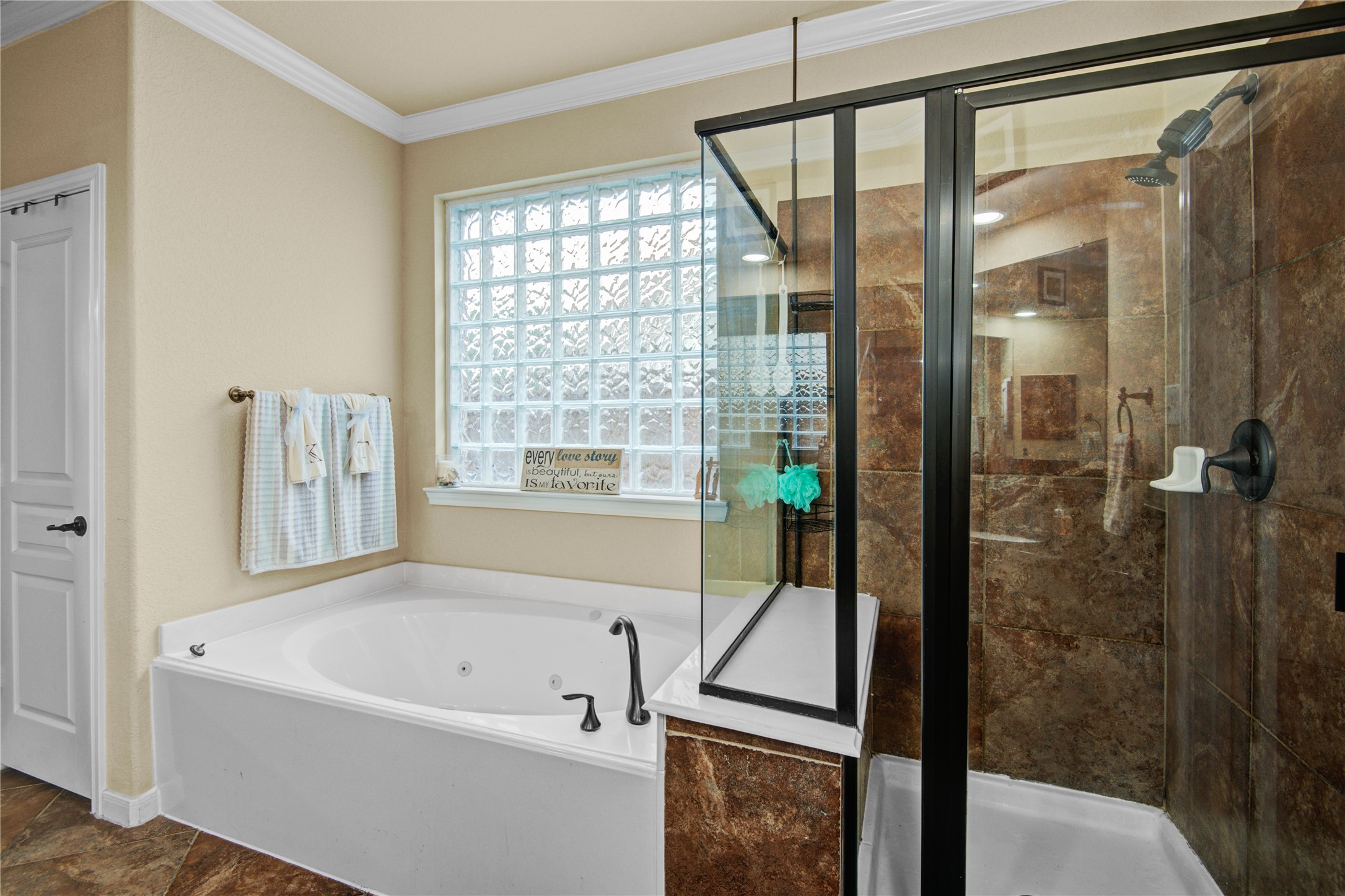 6007 Valhalla Drive Spring, TX 77379 - Photo 20 of 37 Unwind in the oversized soaking tub while enjoying the convenience of a separate walk-in shower and abundant counter space.