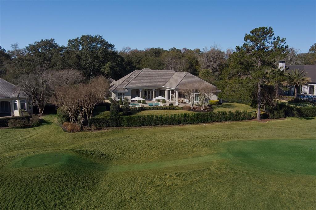 8761 Northwest 31st Lane Road Ocala, FL 34482 - Photo 24 of 25 a front view of a house with garden