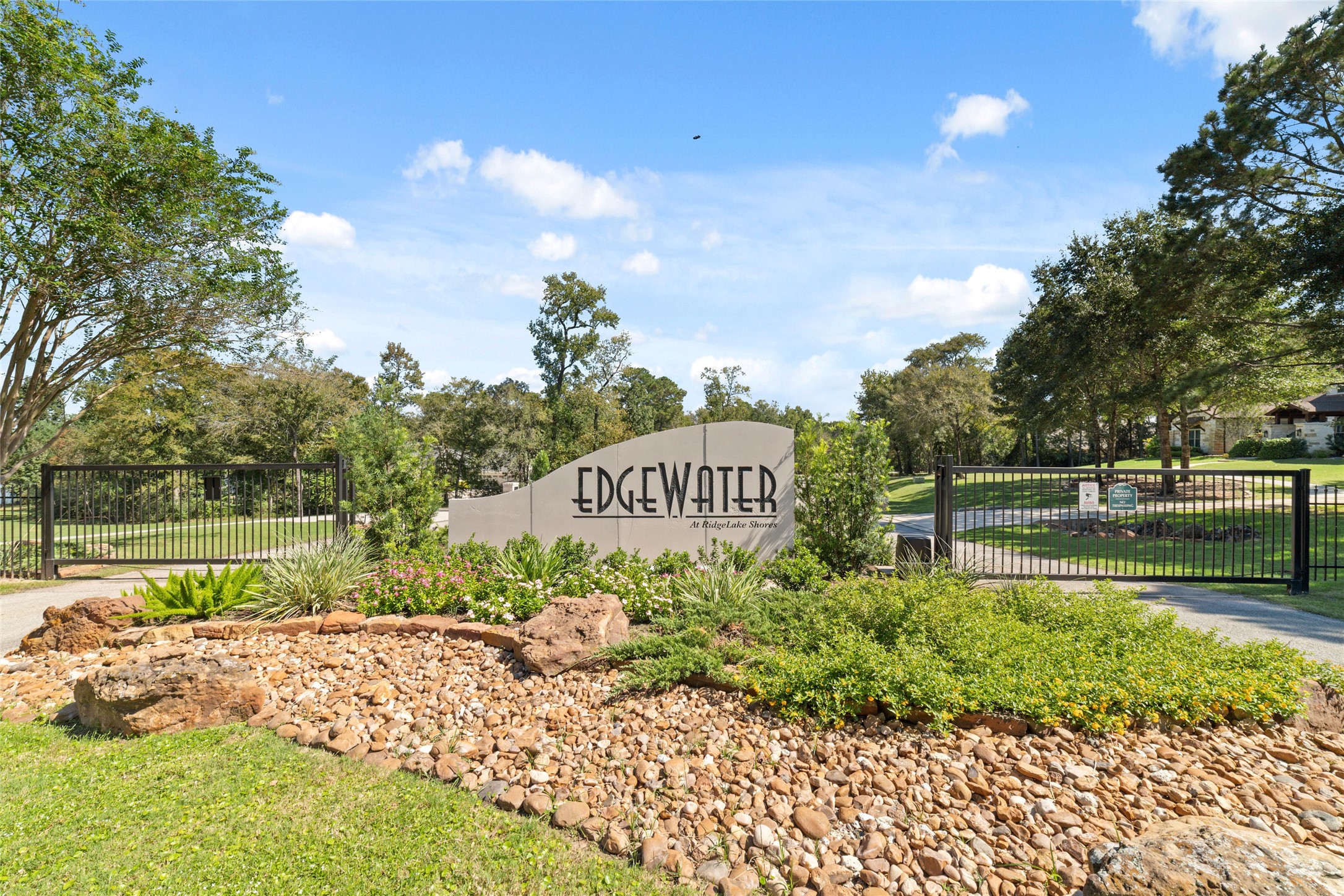 0 Ridgelake Court Montgomery, TX 77316 - Photo 17 of 29 Welcome to Edgewater at Ridgelake Shores, a gated community offering serene surroundings and lush landscaping for a peaceful lifestyle.