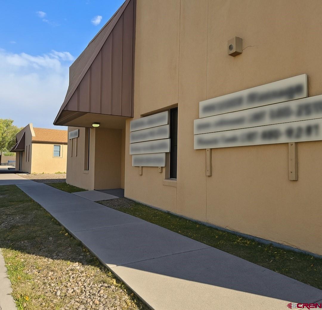 422 Fourth Street Alamosa, CO 81101 - Photo 2 of 15 a view of backyard with garage