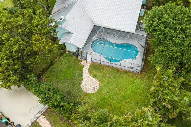 a view of a house with a swimming pool