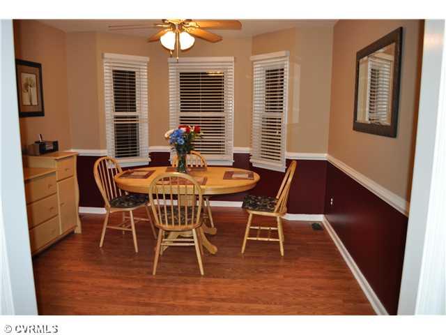 12103 Chatham Road Prince George, VA 23875 - Photo 2 of 18 Dining Room - Dining right off of kitchen with chair rail and beautiful bay window overlooking front lawn.