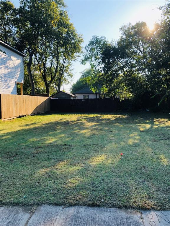 a view of swimming pool with a yard