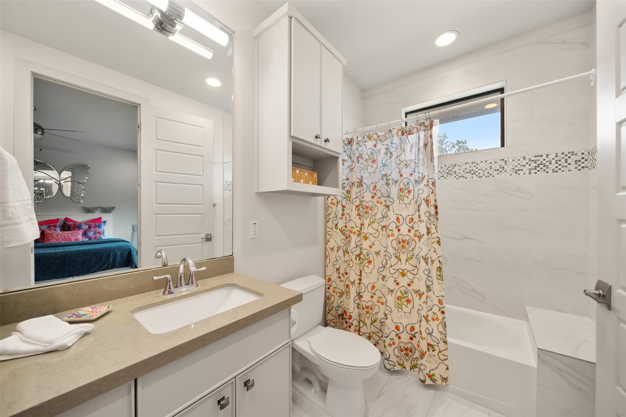 24902 Delaney Knoll Spring, TX 77389 - Photo 28 of 49 a bathroom with a granite countertop sink toilet mirror and shower
