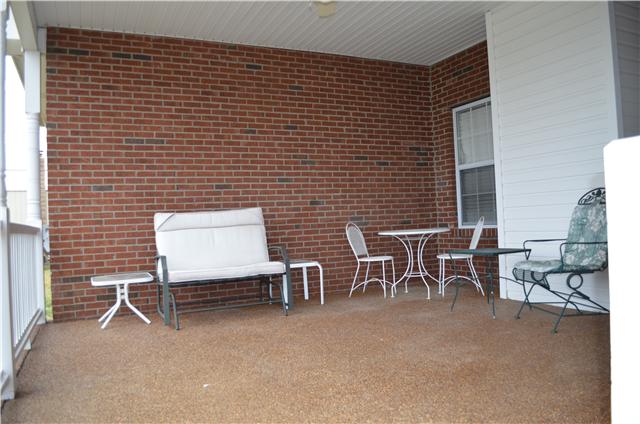 5250 East Robertson Road Cross Plains, TN 37049 - Photo 18 of 20 Covered Rear Porch For Relaxing the Day Away.....