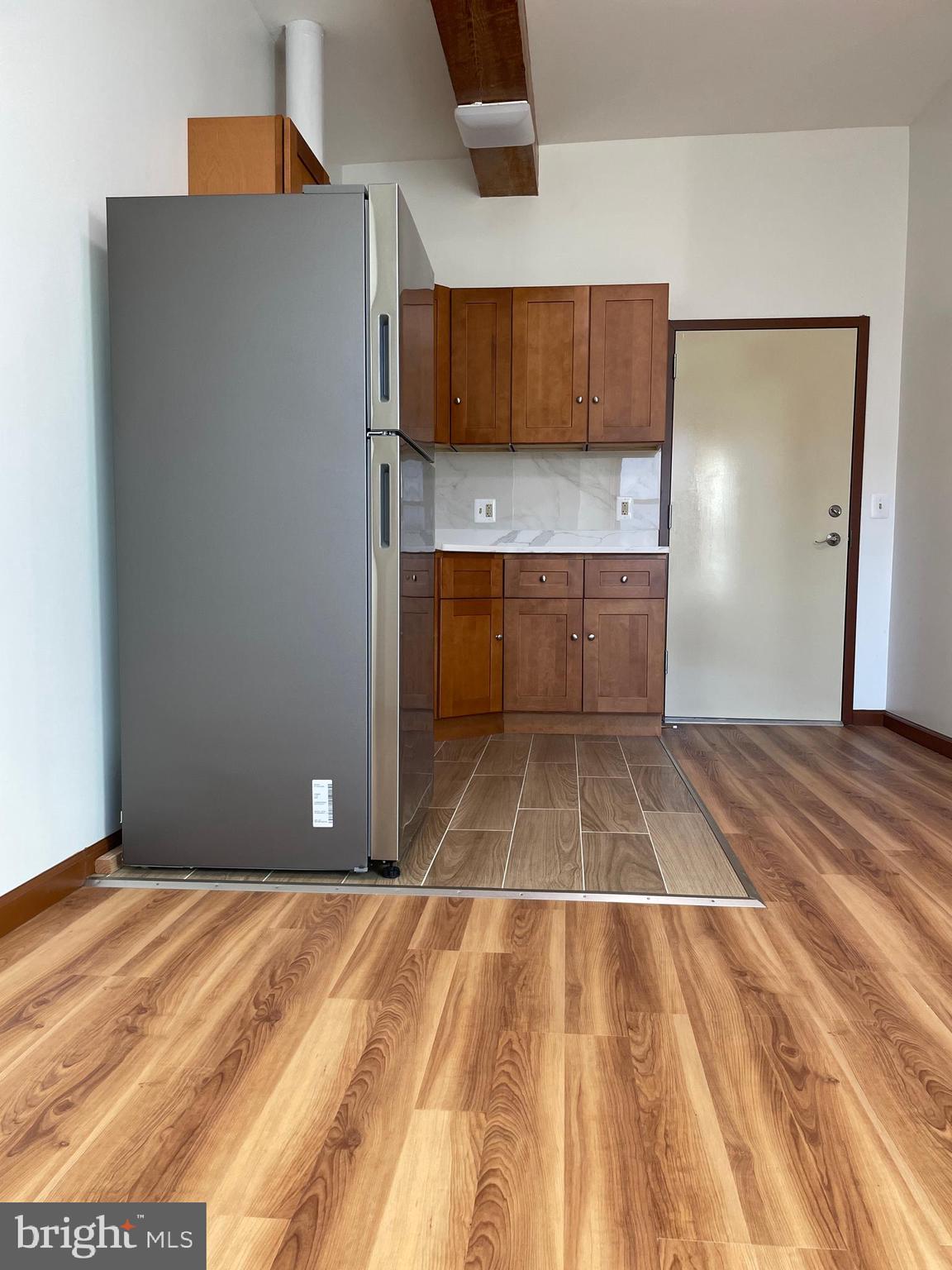 146 North 10th Street, Unit 4B Philadelphia, PA 19107 - Photo 3 of 7 a bathroom with a sink and a mirror