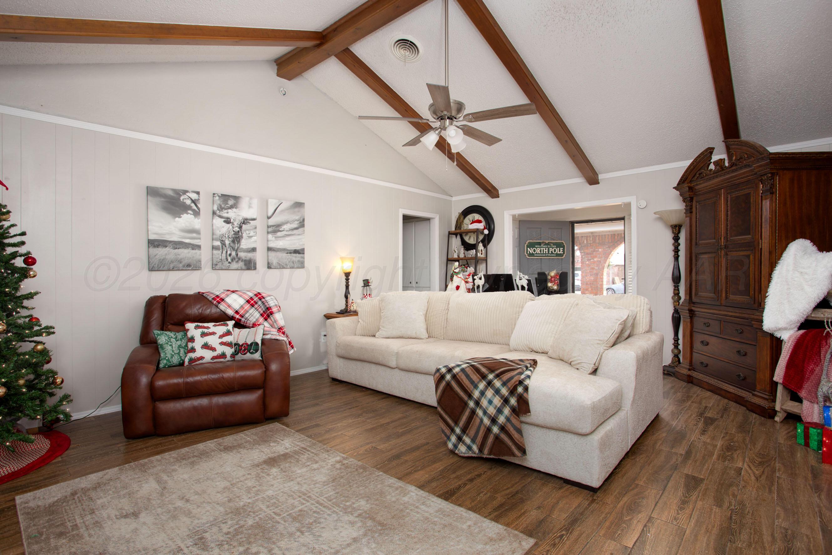 2907 Mable Drive Canyon, TX 79015 - Photo 11 of 23 a living room with furniture and a flat screen tv
