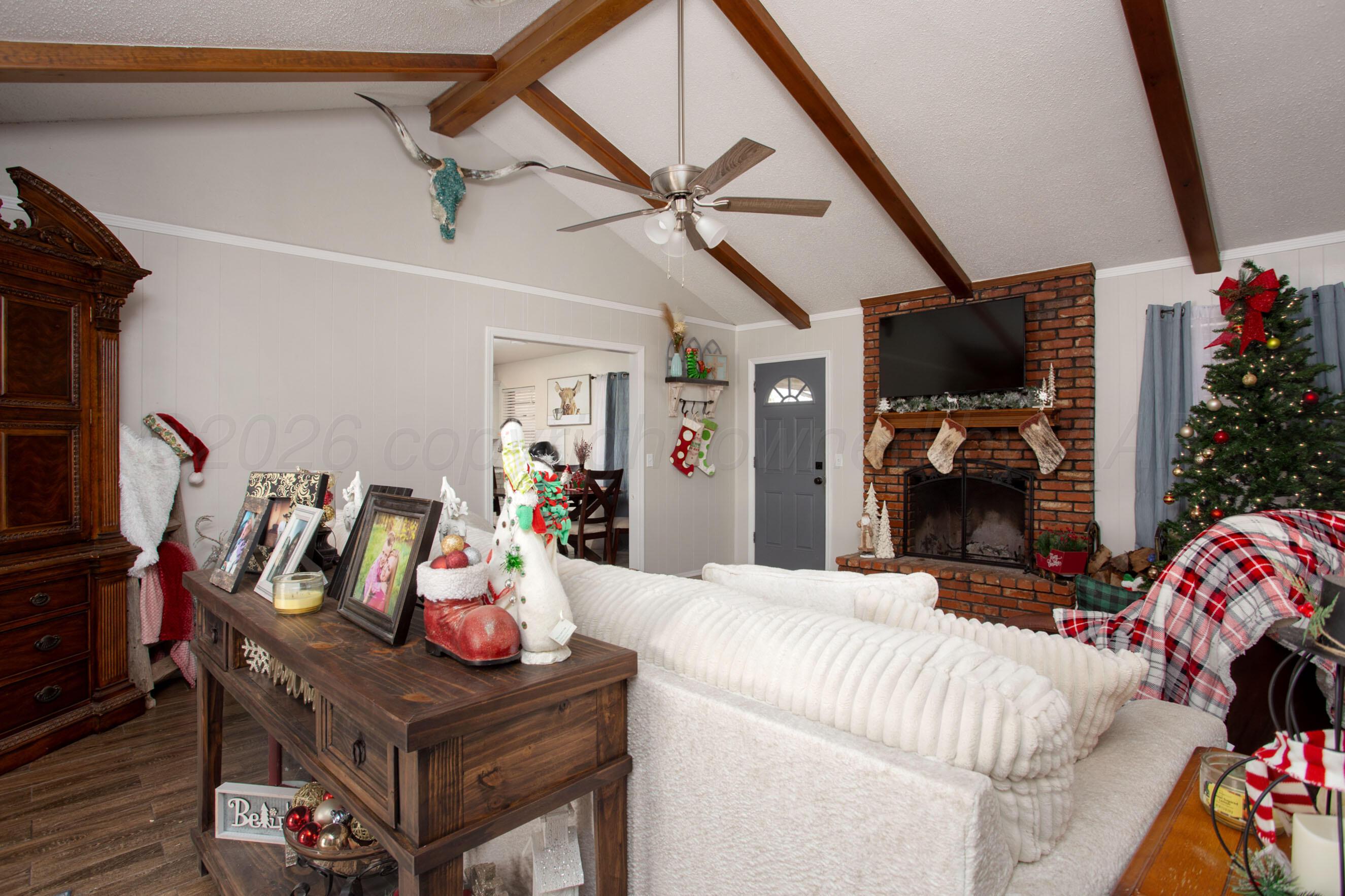 2907 Mable Drive Canyon, TX 79015 - Photo 13 of 23 a living room with furniture and a flat screen tv