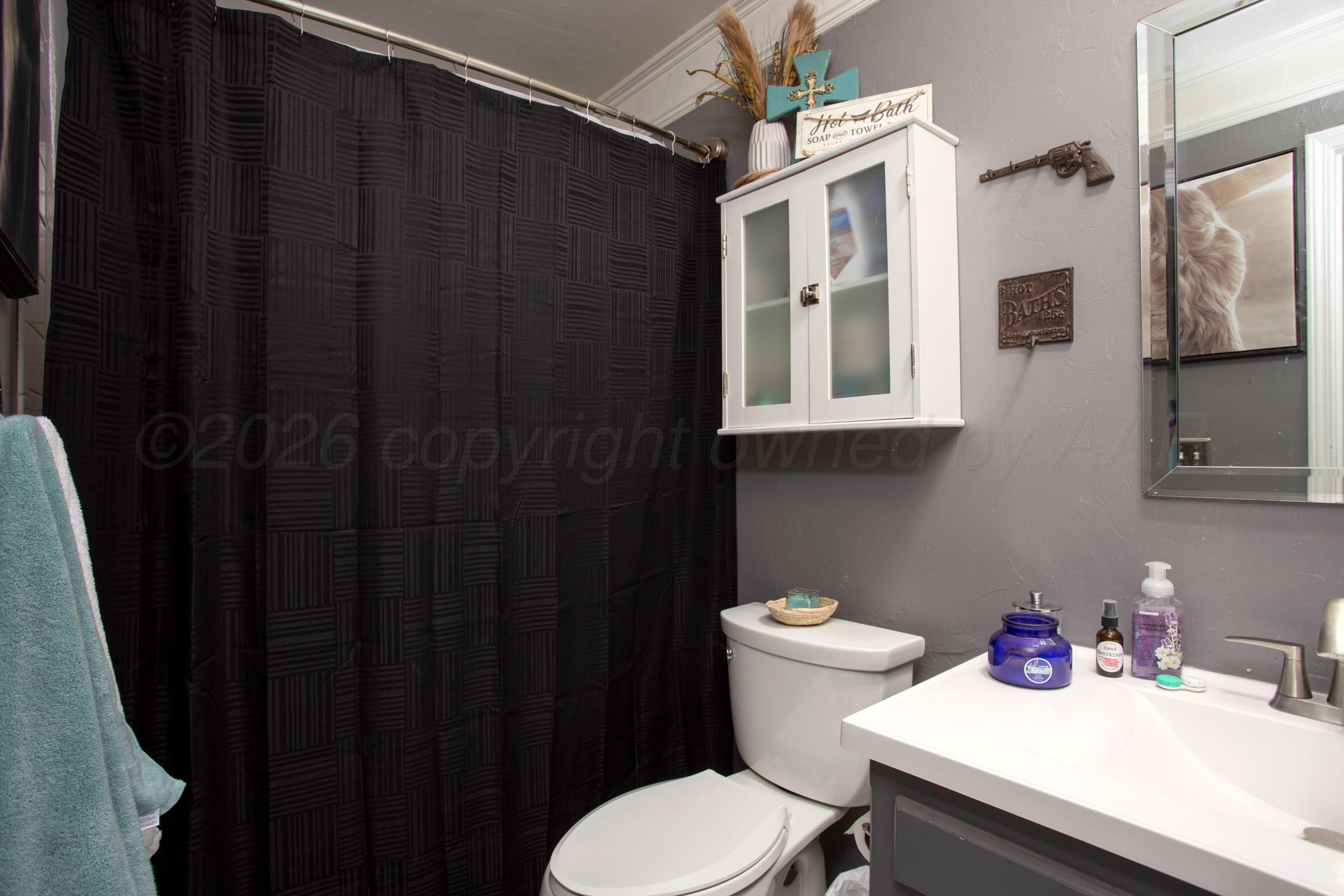 2907 Mable Drive Canyon, TX 79015 - Photo 22 of 23 a bathroom with a sink toilet vanity and tub