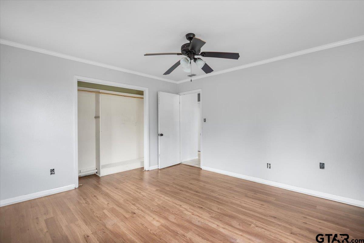 13546 FM 3271 Tyler, TX 75704 - Photo 12 of 20 a view of room with hardwood floor and ceiling fan