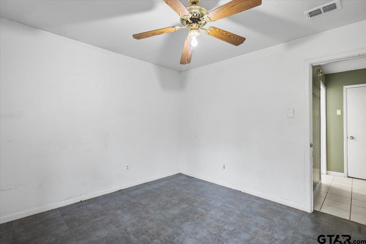 13546 FM 3271 Tyler, TX 75704 - Photo 18 of 20 an empty room with chandelier fan