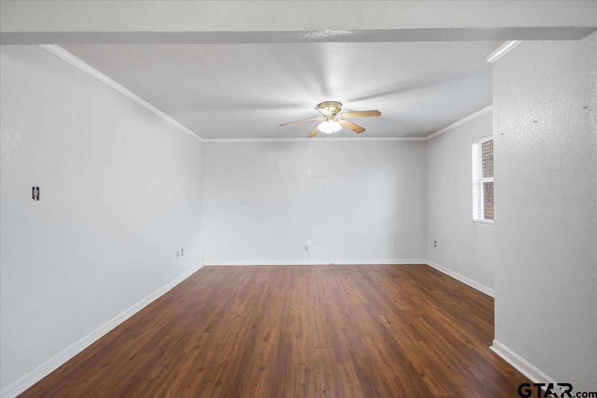 13546 FM 3271 Tyler, TX 75704 - Photo 4 of 20 wooden floor in an empty room with a window