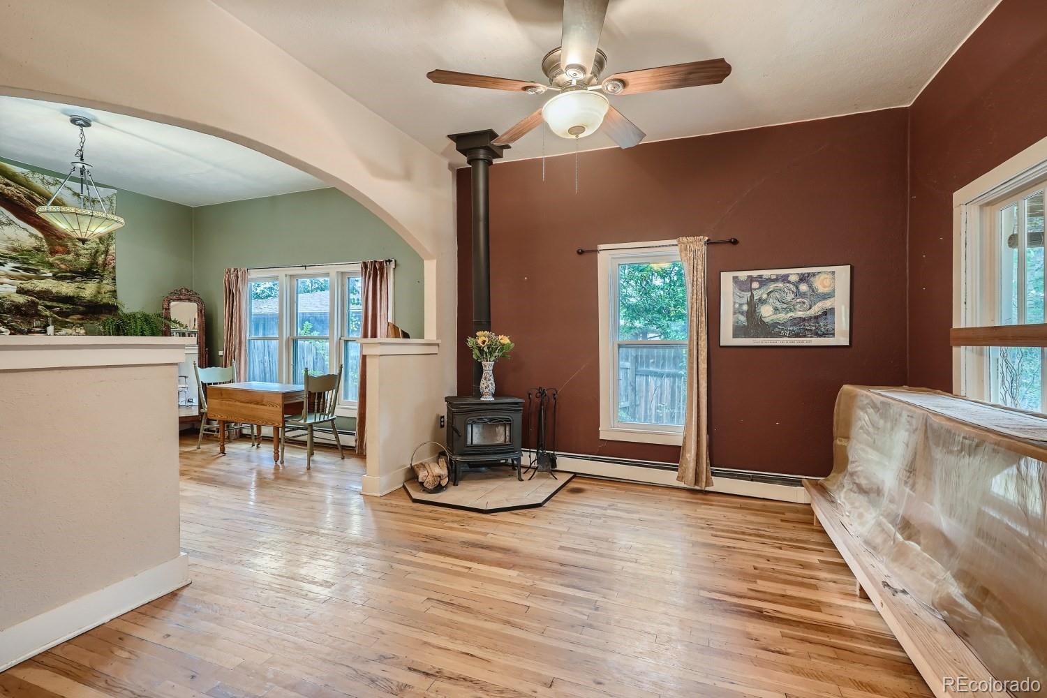 507 West Baseline Road Lafayette, CO 80026 - Photo 6 of 28 a living room with furniture and wooden floor