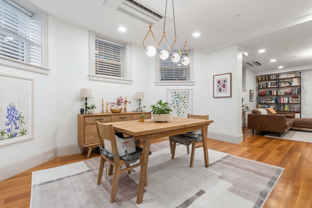 1762 Beacon Street, Unit 1 Brookline, MA 02445 - Photo 4 of 17 a view of a dining room with furniture