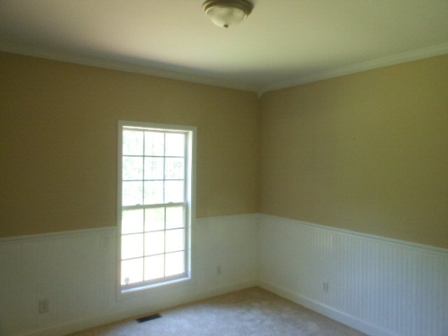 173 Gordon Road Gray, GA 31032 - Photo 4 of 18 an empty room with a window