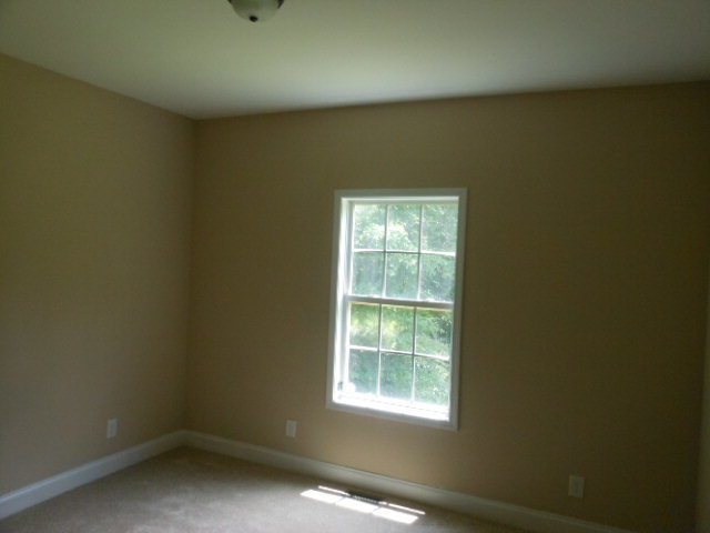 173 Gordon Road Gray, GA 31032 - Photo 5 of 18 an empty room with a window