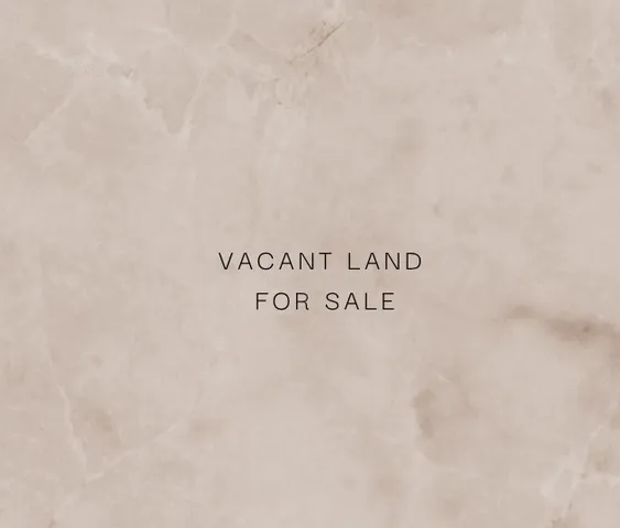 a wall with a sign on it