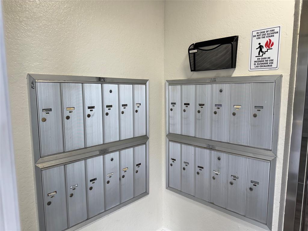 1520 Whitehall Drive, Unit 306 Davie, FL 33324 - Photo 41 of 42 a view of cabinets with wooden floor