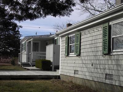 10 George Street Barnstable, MA 02630 - Photo 6 of 11 a view of a house with a patio