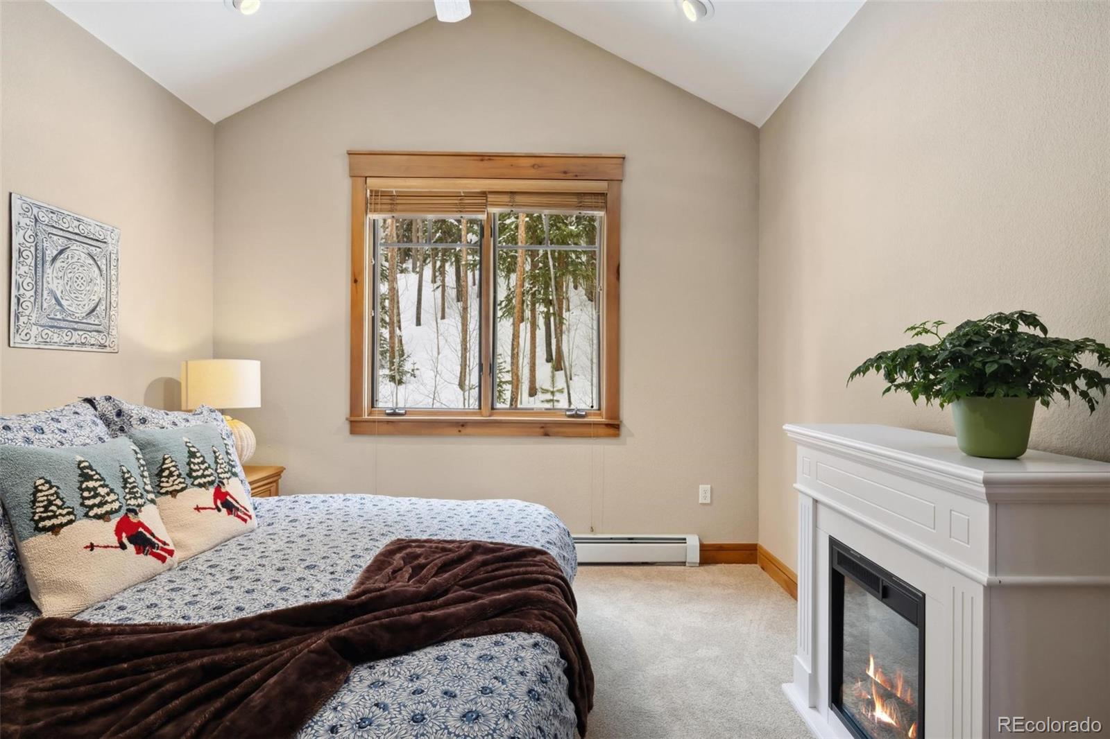 129 Tip Top Trail, Unit 6543 Dillon, CO 80435 - Photo 14 of 40 a bedroom with a bed and a window