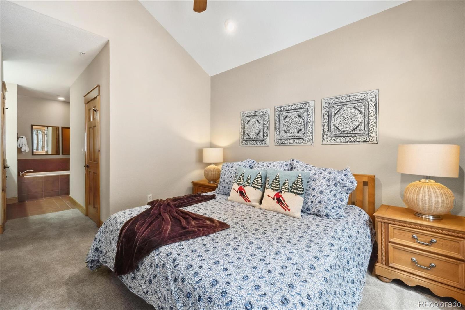 129 Tip Top Trail, Unit 6543 Dillon, CO 80435 - Photo 16 of 40 a bedroom with a bed and cupboard