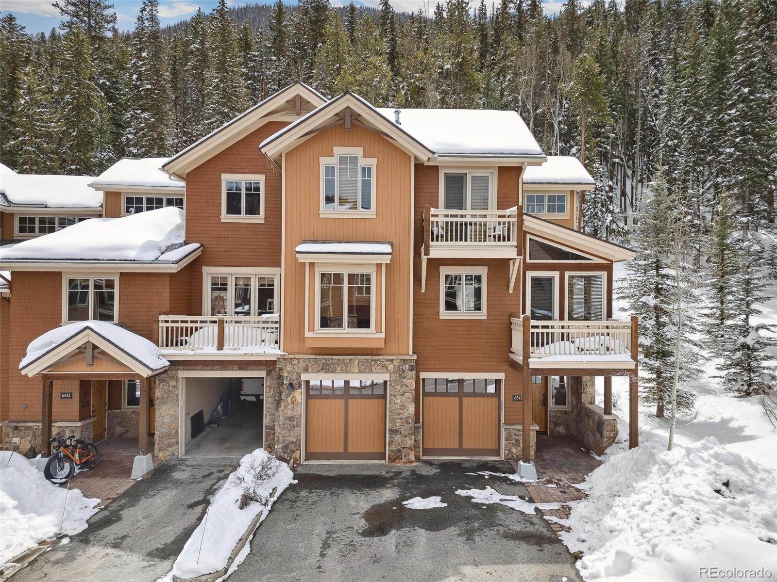 129 Tip Top Trail, Unit 6543 Dillon, CO 80435 - Photo 2 of 40 a front view of a house with a yard